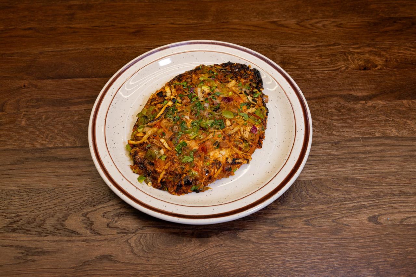 A Yemenat dish served on a ceramic plate